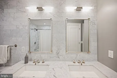 a view of a patio with a table and chairs