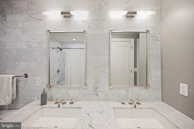 a view of a patio with a table and chairs