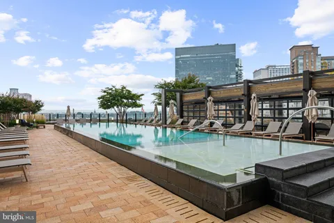 a kitchen with a large window and a table