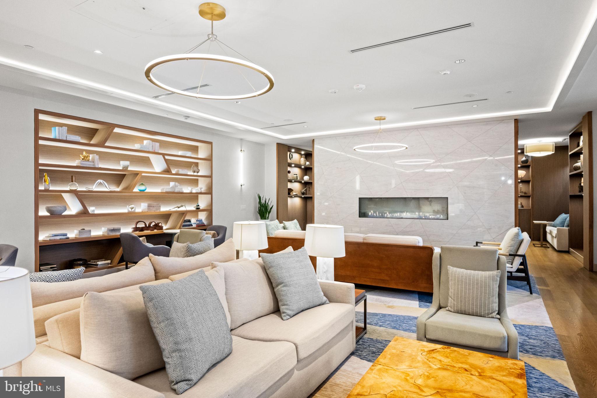 1330 Lancaster Street, Unit C603 Baltimore, MD 21231 - Photo 52 of 63 a living room with furniture and a large window