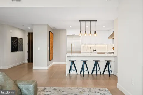 a kitchen with a stove and a sink
