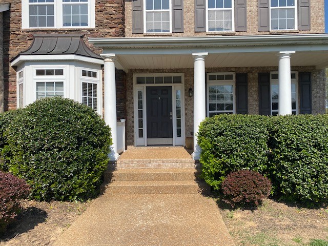 3018 Langston Place Spring Hill, TN 37174 - Photo 2 of 33 front view of a building
