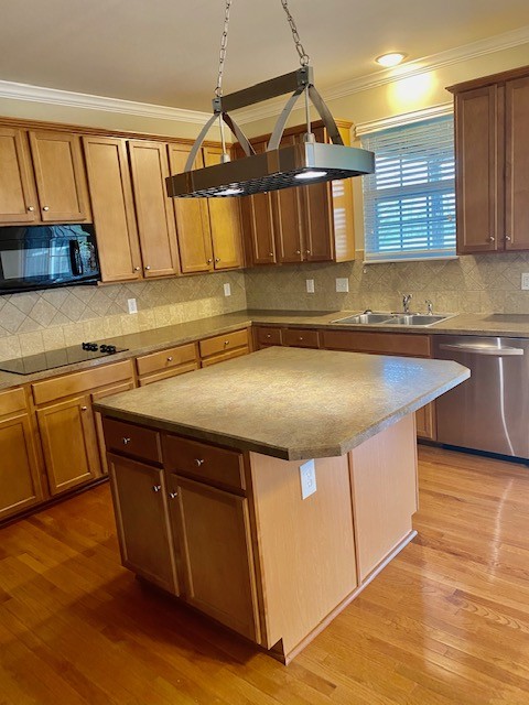 3018 Langston Place Spring Hill, TN 37174 - Photo 11 of 33 a kitchen with a sink a cabinets and wooden floor
