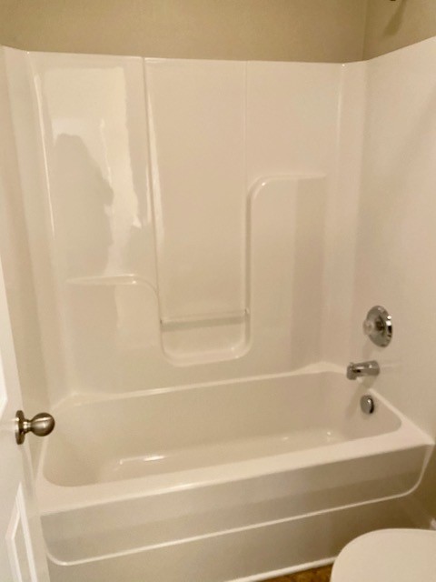 3018 Langston Place Spring Hill, TN 37174 - Photo 18 of 33 a bathroom with a bathtub