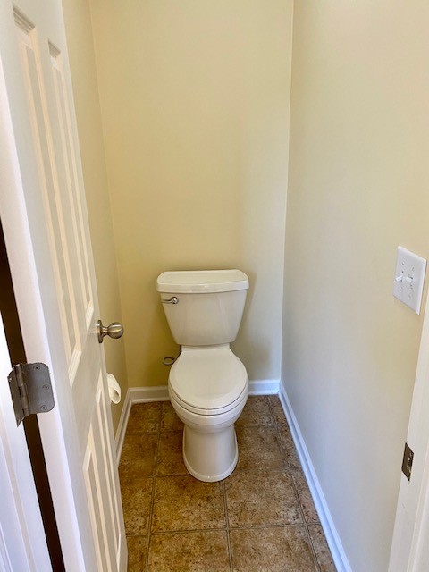 3018 Langston Place Spring Hill, TN 37174 - Photo 25 of 33 a bathroom with a toilet and a sink