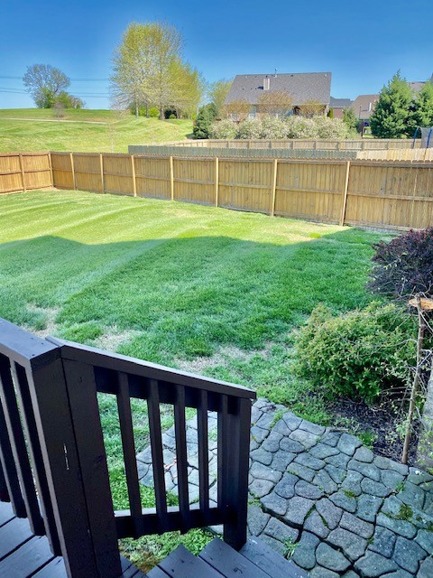 3018 Langston Place Spring Hill, TN 37174 - Photo 31 of 33 a view of a backyard with a garden