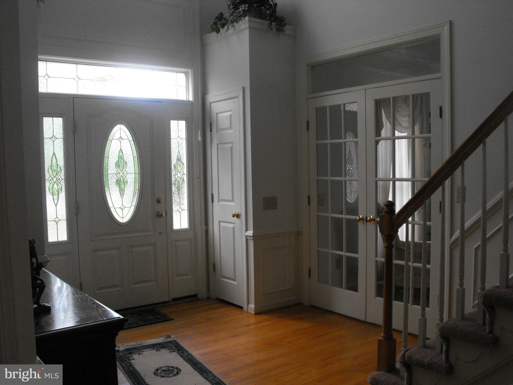 Foyer with Hardwood Floors