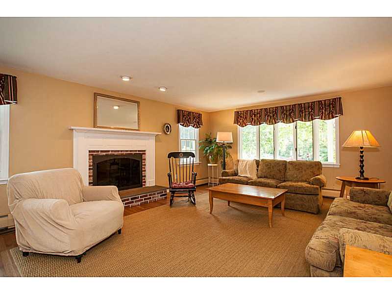 75 Signal Ridge Way East Greenwich, RI 02818 - Photo 10 of 23 Den/Family/Great Room. Hardwoods, built-ins and gas insert.