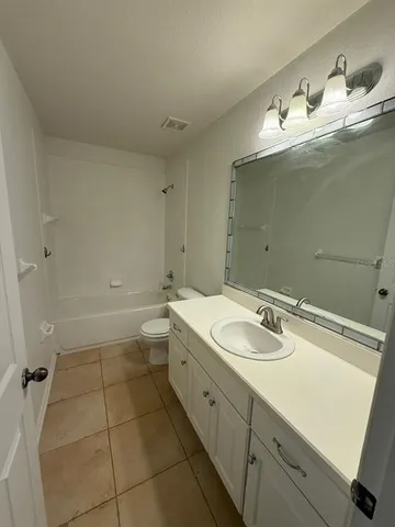 an empty room with a empty space and window