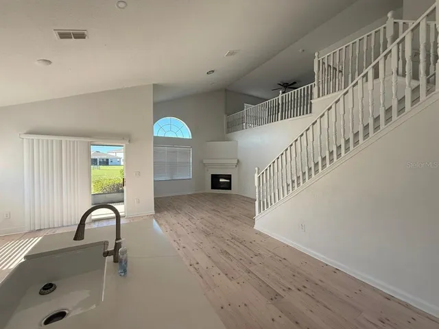 a view of entryway with wooden floor