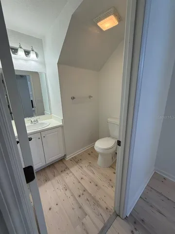 wooden floor and window in an empty room