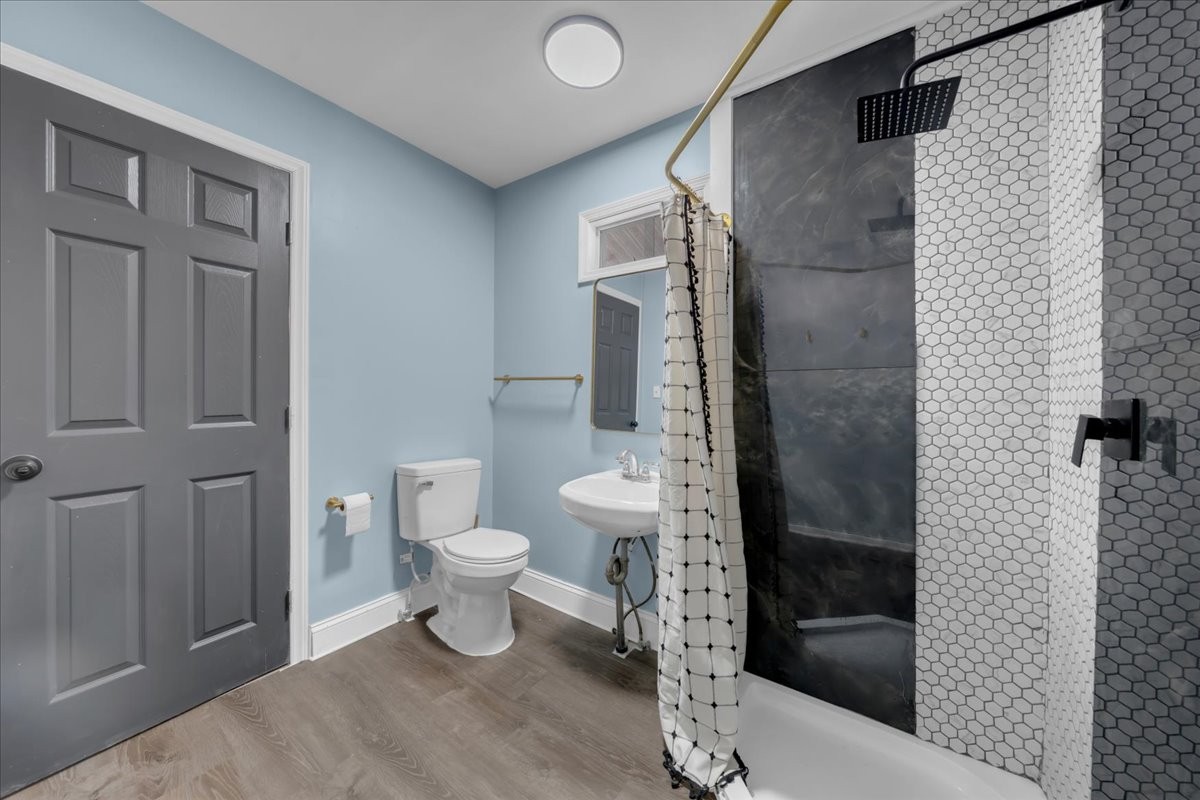 1007 Sycamore Drive Manchester, TN 37355 - Photo 24 of 100 a bathroom with a toilet and a shower