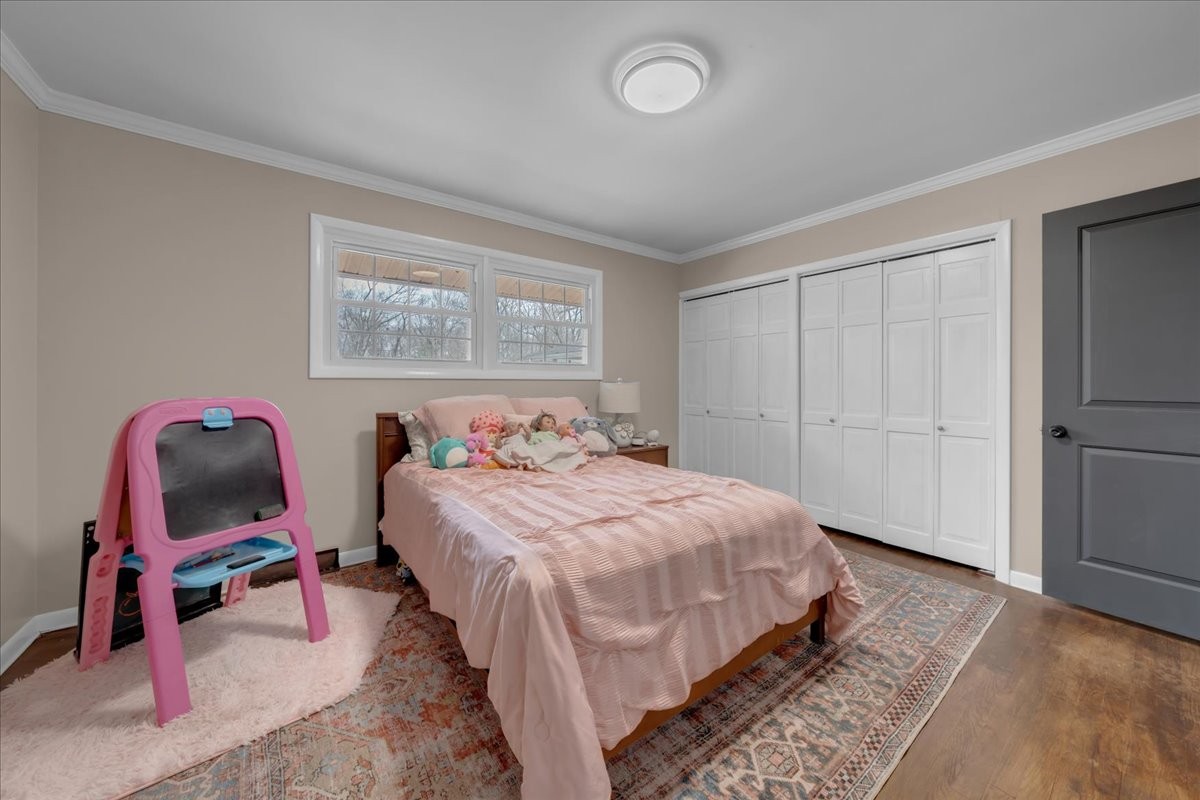 1007 Sycamore Drive Manchester, TN 37355 - Photo 36 of 100 a bedroom with a bed a desk and chair