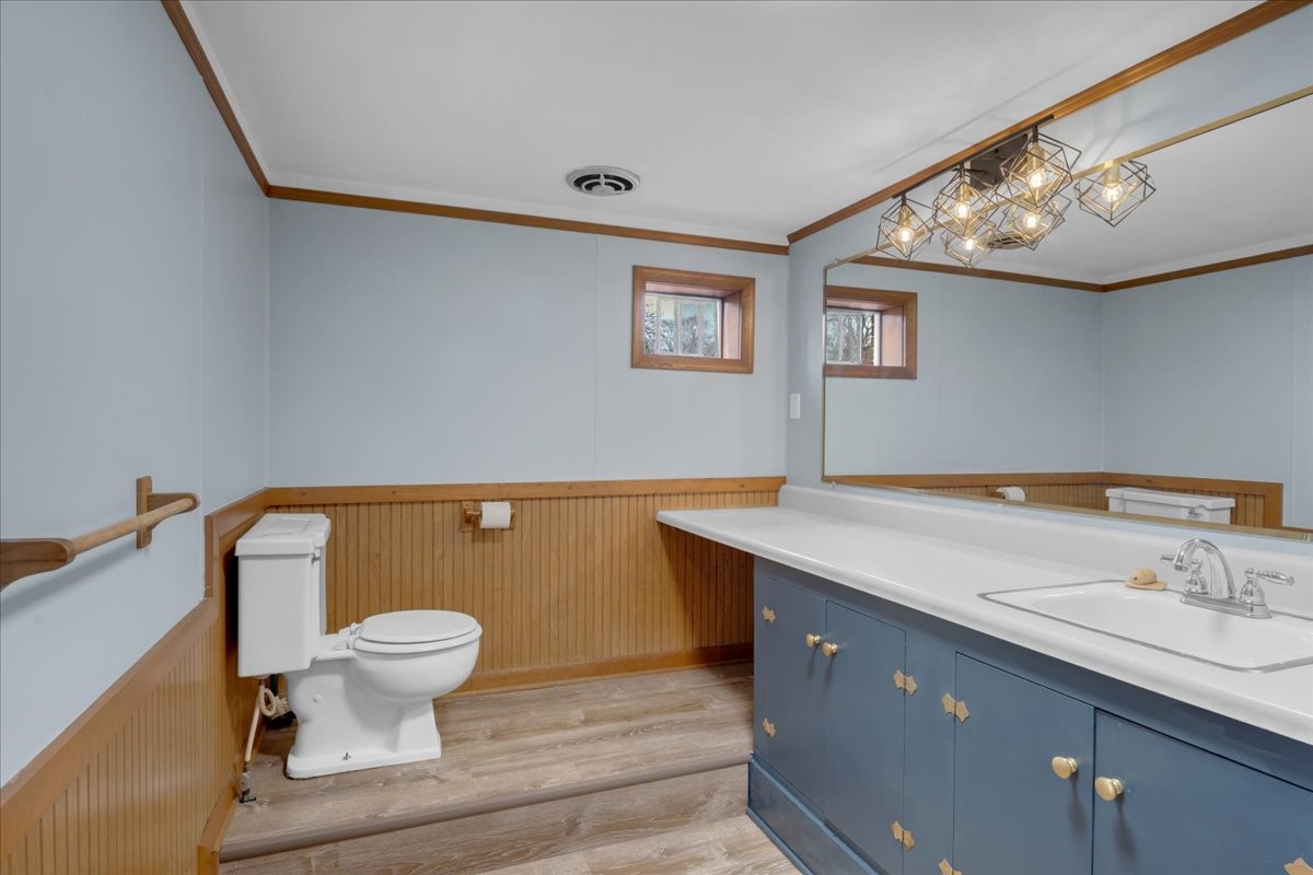 1007 Sycamore Drive Manchester, TN 37355 - Photo 37 of 100 a bathroom with a sink mirror vanity and toilet