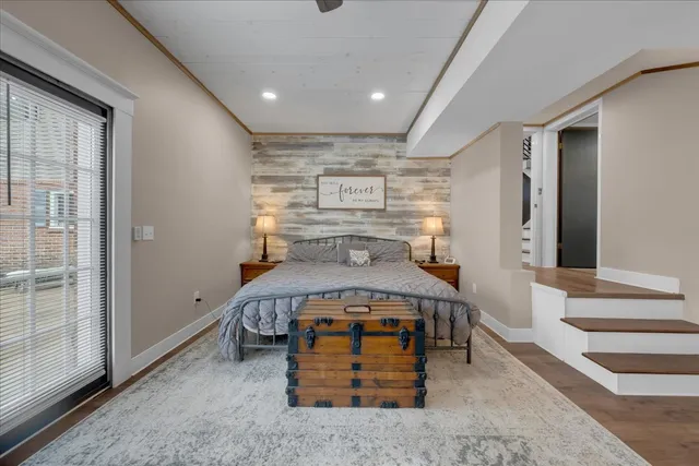 a view of a house with pool and a yard