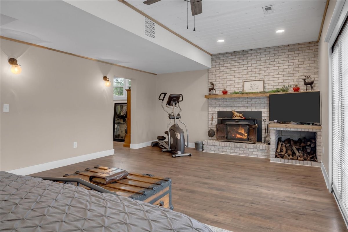 1007 Sycamore Drive Manchester, TN 37355 - Photo 40 of 100 a living room with furniture a flat screen tv and a fireplace