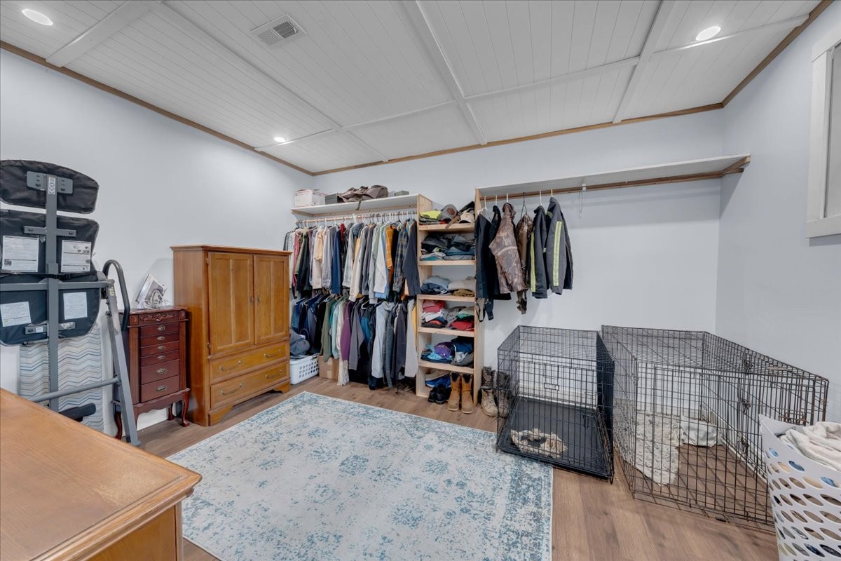 1007 Sycamore Drive Manchester, TN 37355 - Photo 43 of 100 a view of walk in closet with clothes and shoes