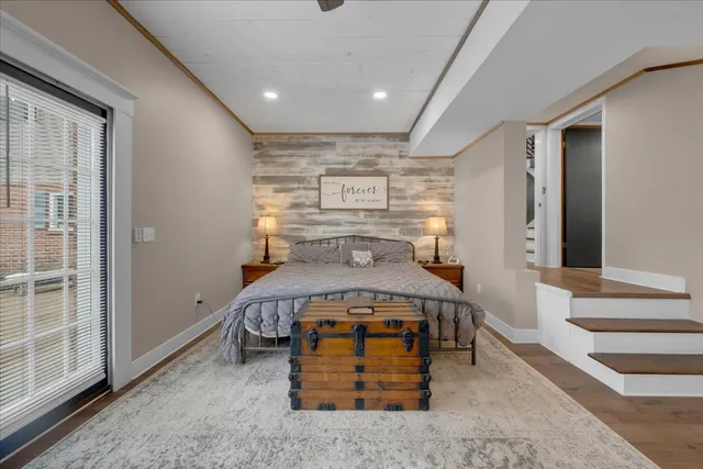 a view of a house with a yard and sitting area