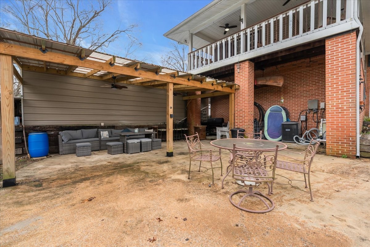 1007 Sycamore Drive Manchester, TN 37355 - Photo 51 of 100 a view of a chairs and tables in patio