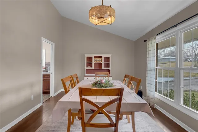 a kitchen with granite countertop a stove and a sink