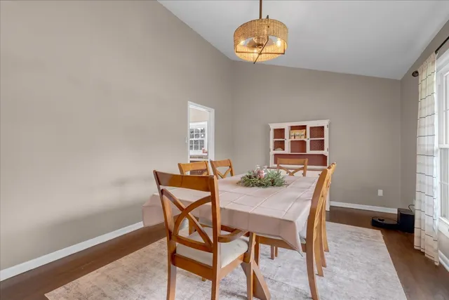 a kitchen with stainless steel appliances a stove a refrigerator and cabinets