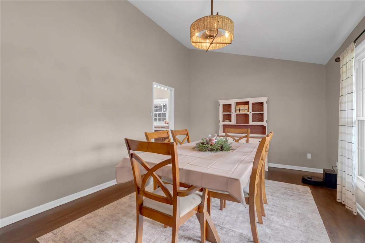 1007 Sycamore Drive Manchester, TN 37355 - Photo 9 of 100 a view of a dining room with furniture and chandelier