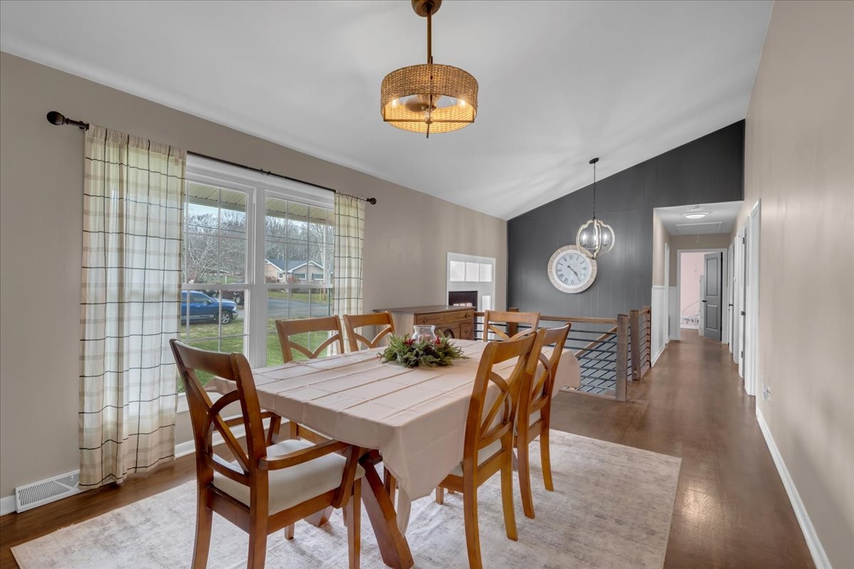 1007 Sycamore Drive Manchester, TN 37355 - Photo 10 of 100 a view of a dining room with furniture window and wooden floor