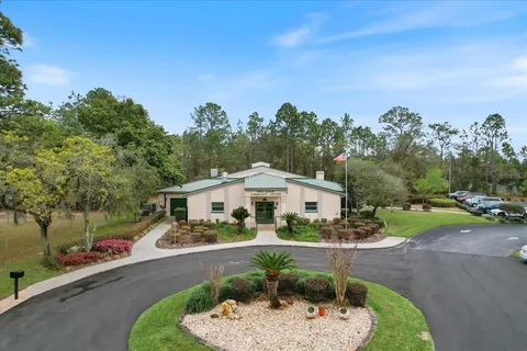 a sign board on the side of the road