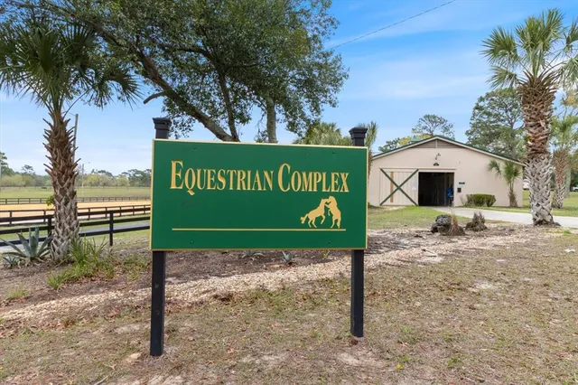 a view of a swimming pool with a lake view