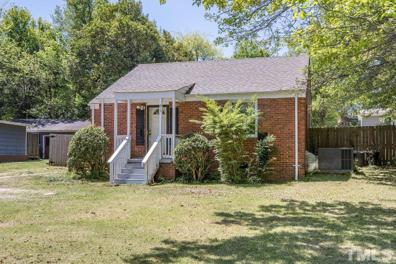 813 North King Charles Road Raleigh, NC 27610 - Photo 20 of 20 a view of a house with backyard and sitting area