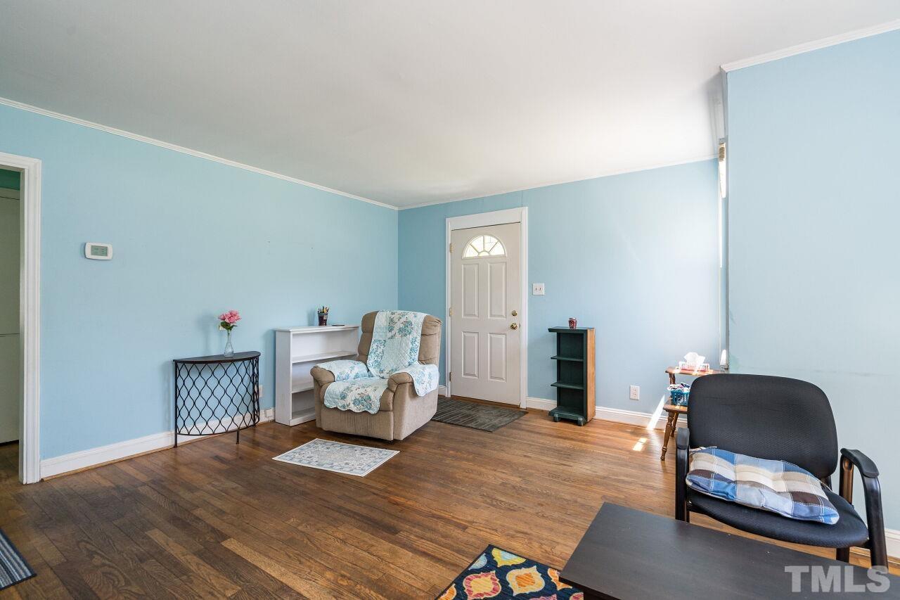 813 North King Charles Road Raleigh, NC 27610 - Photo 5 of 20 a living room with furniture