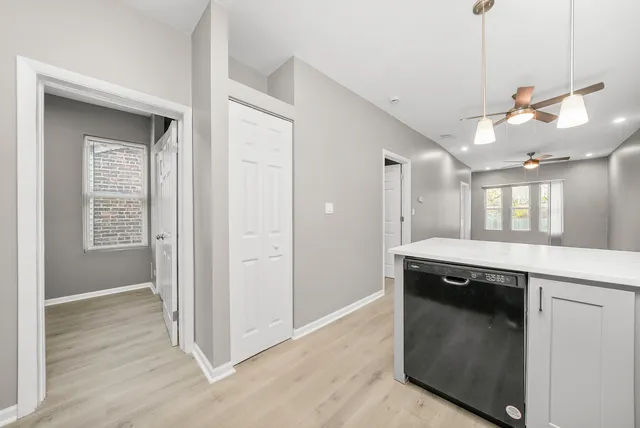 a view of a kitchen with a sink and dishwasher kitchen view