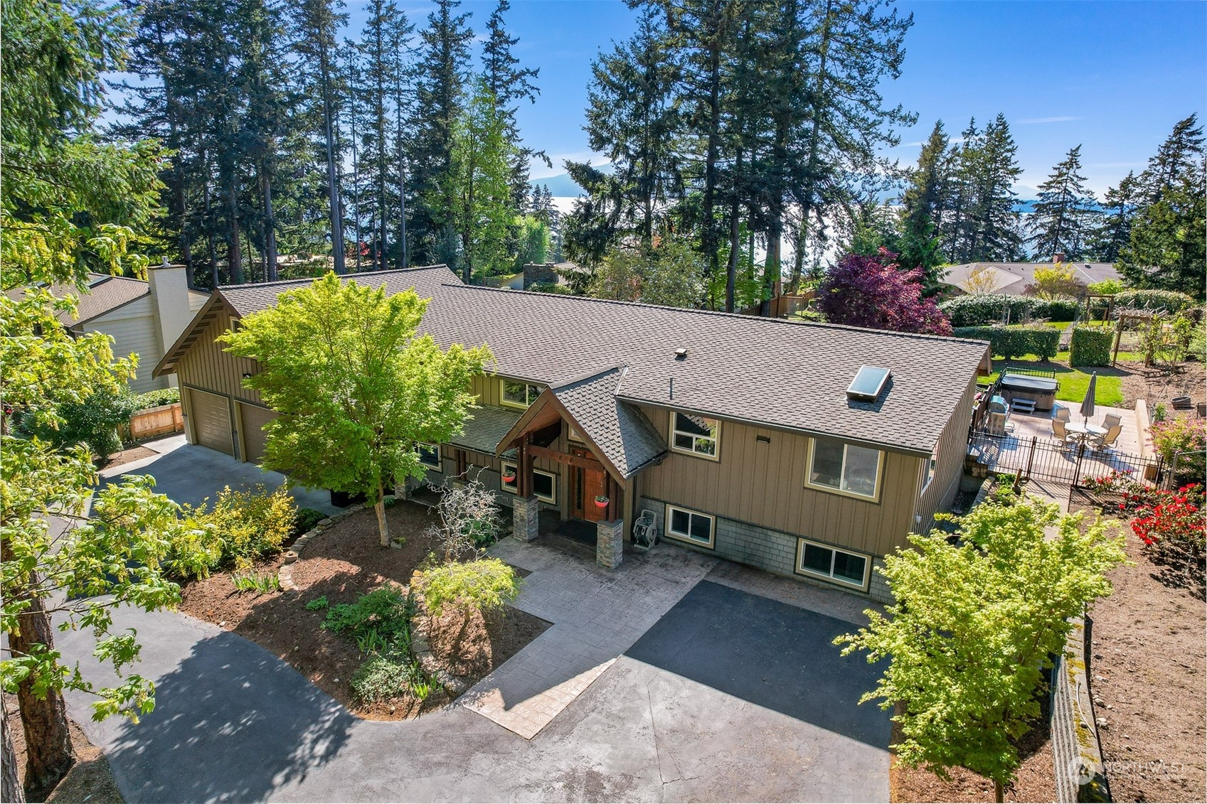 414 Fieldston Road Bellingham, WA 98225 - Photo 2 of 27 an aerial view of a house with a yard basket ball court and outdoor seating
