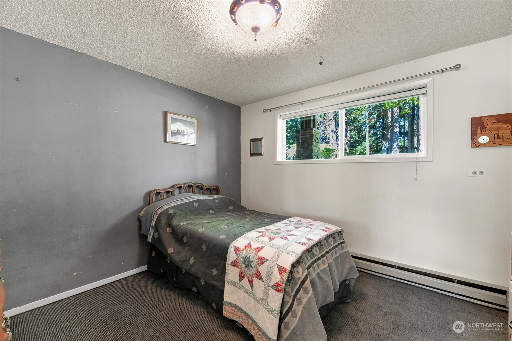 414 Fieldston Road Bellingham, WA 98225 - Photo 21 of 27 a bedroom with a bed and a window