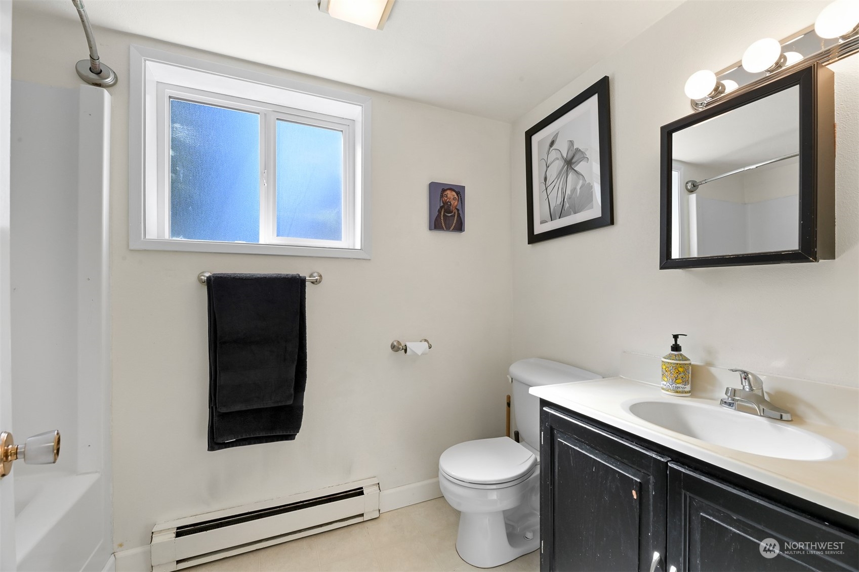 414 Fieldston Road Bellingham, WA 98225 - Photo 22 of 27 a bathroom with a toilet sink and mirror