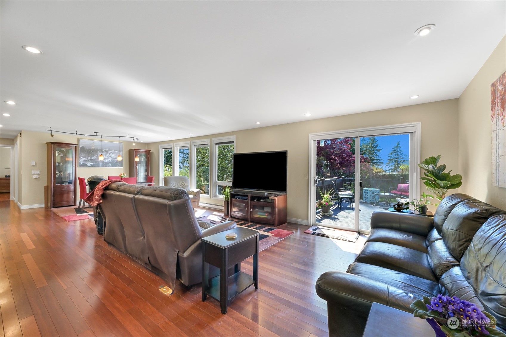 414 Fieldston Road Bellingham, WA 98225 - Photo 8 of 27 a living room with furniture and a flat screen tv