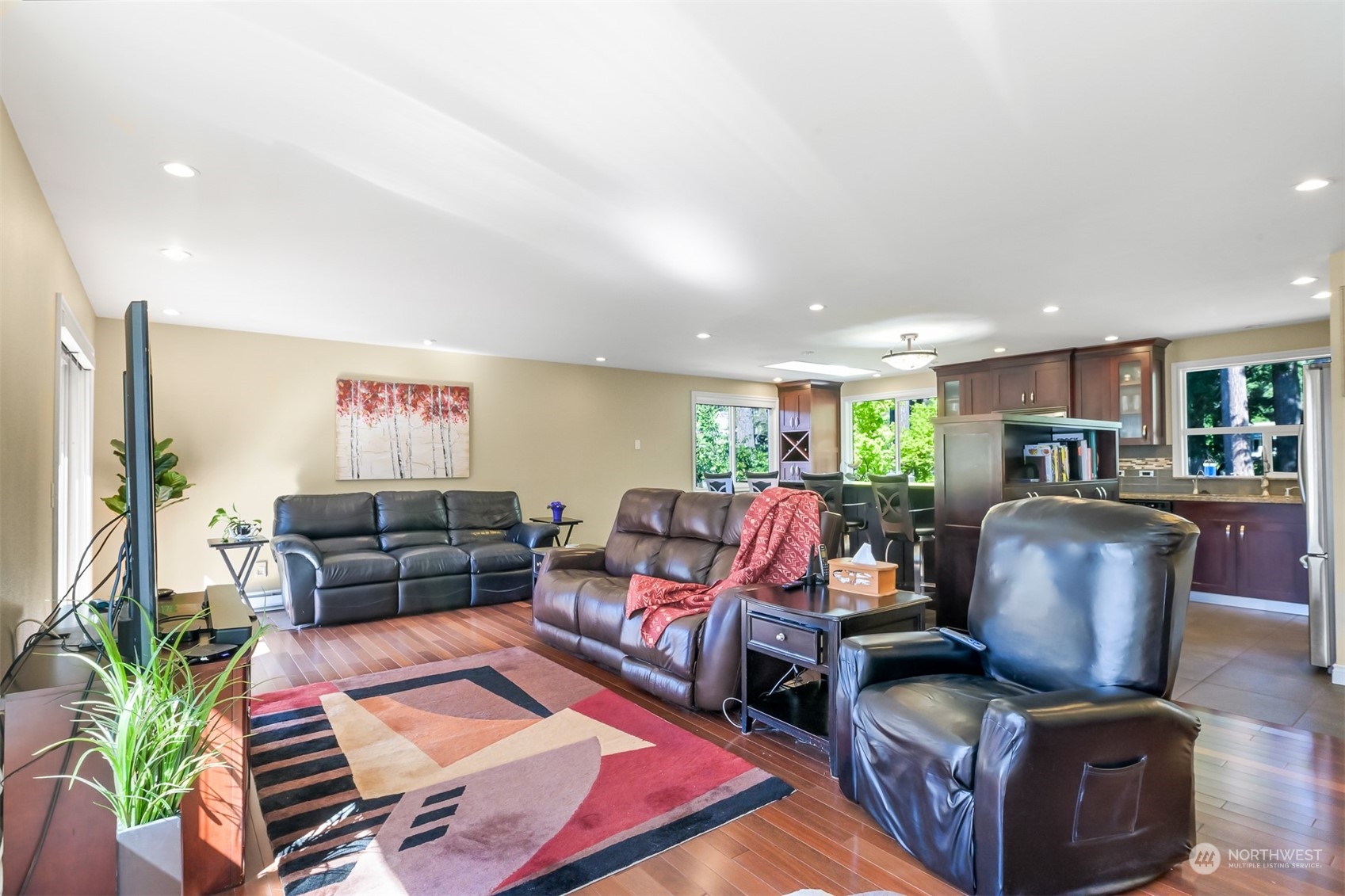 414 Fieldston Road Bellingham, WA 98225 - Photo 9 of 27 a living room with furniture and a flat screen tv