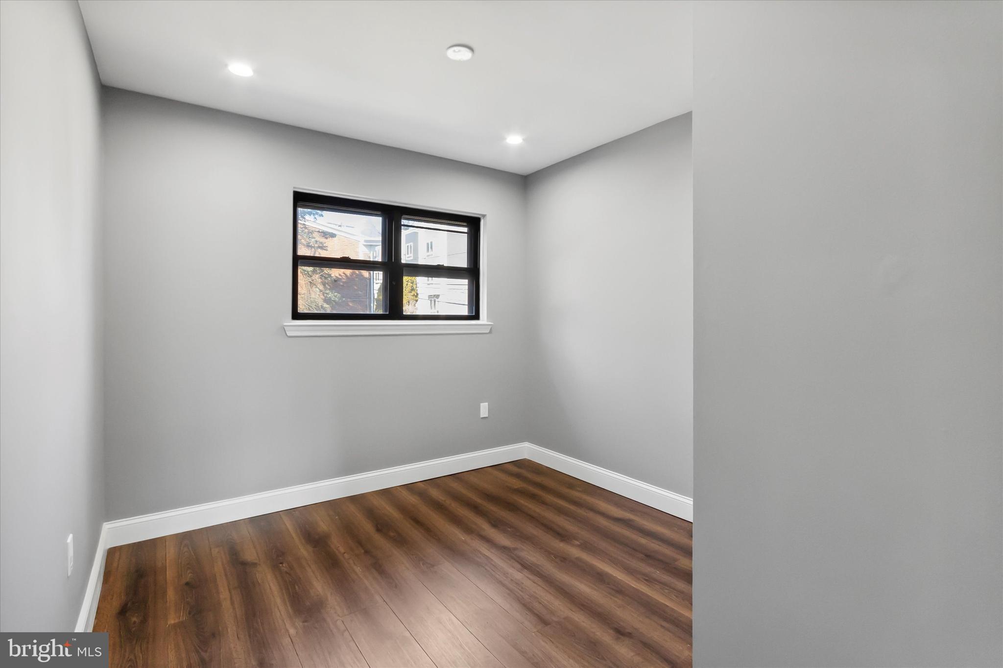 296 Greenough Street, Unit 2 Philadelphia, PA 19127 - Photo 11 of 24 a view of empty room with wooden floor