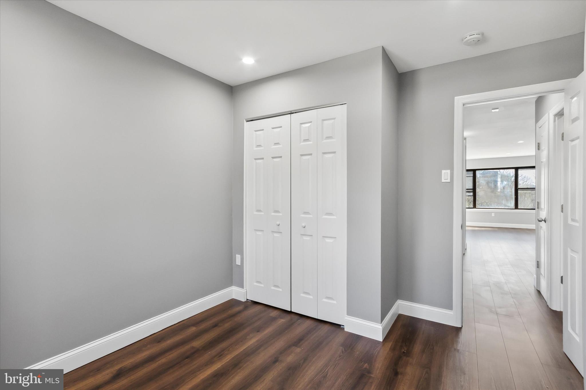 296 Greenough Street, Unit 2 Philadelphia, PA 19127 - Photo 12 of 24 wooden floor in an empty room
