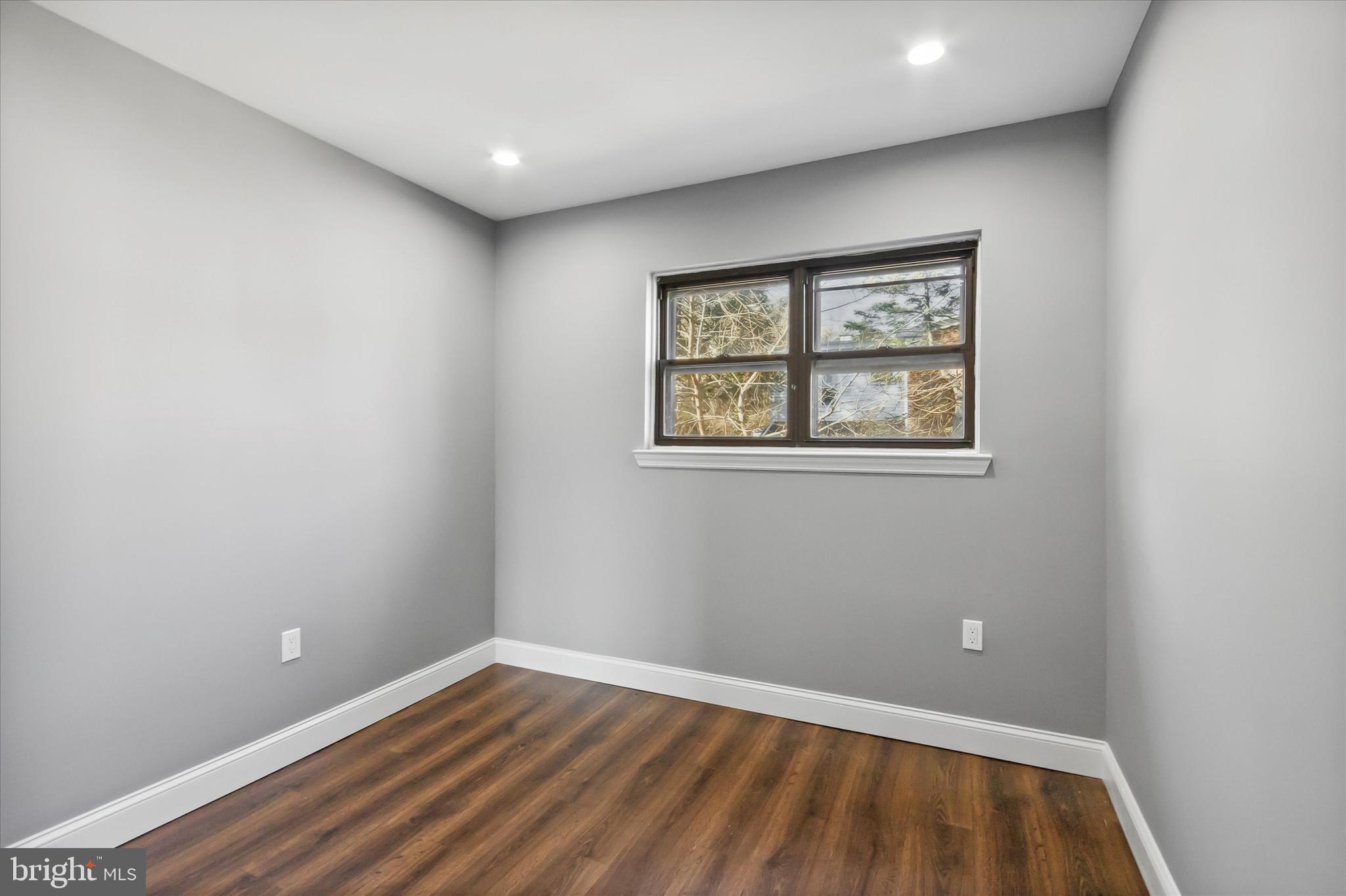 296 Greenough Street, Unit 2 Philadelphia, PA 19127 - Photo 14 of 24 an empty room with a window