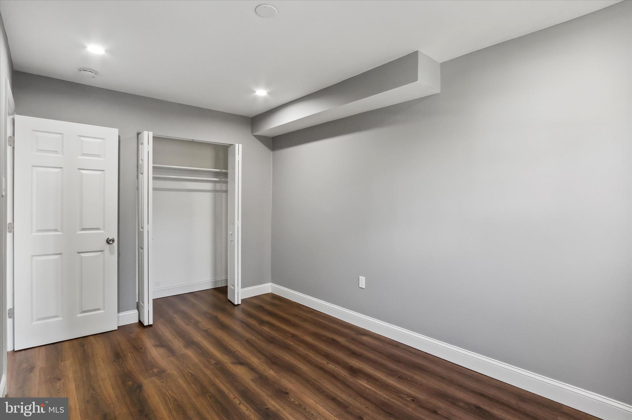 296 Greenough Street, Unit 2 Philadelphia, PA 19127 - Photo 16 of 24 a view of room with hardwood floor