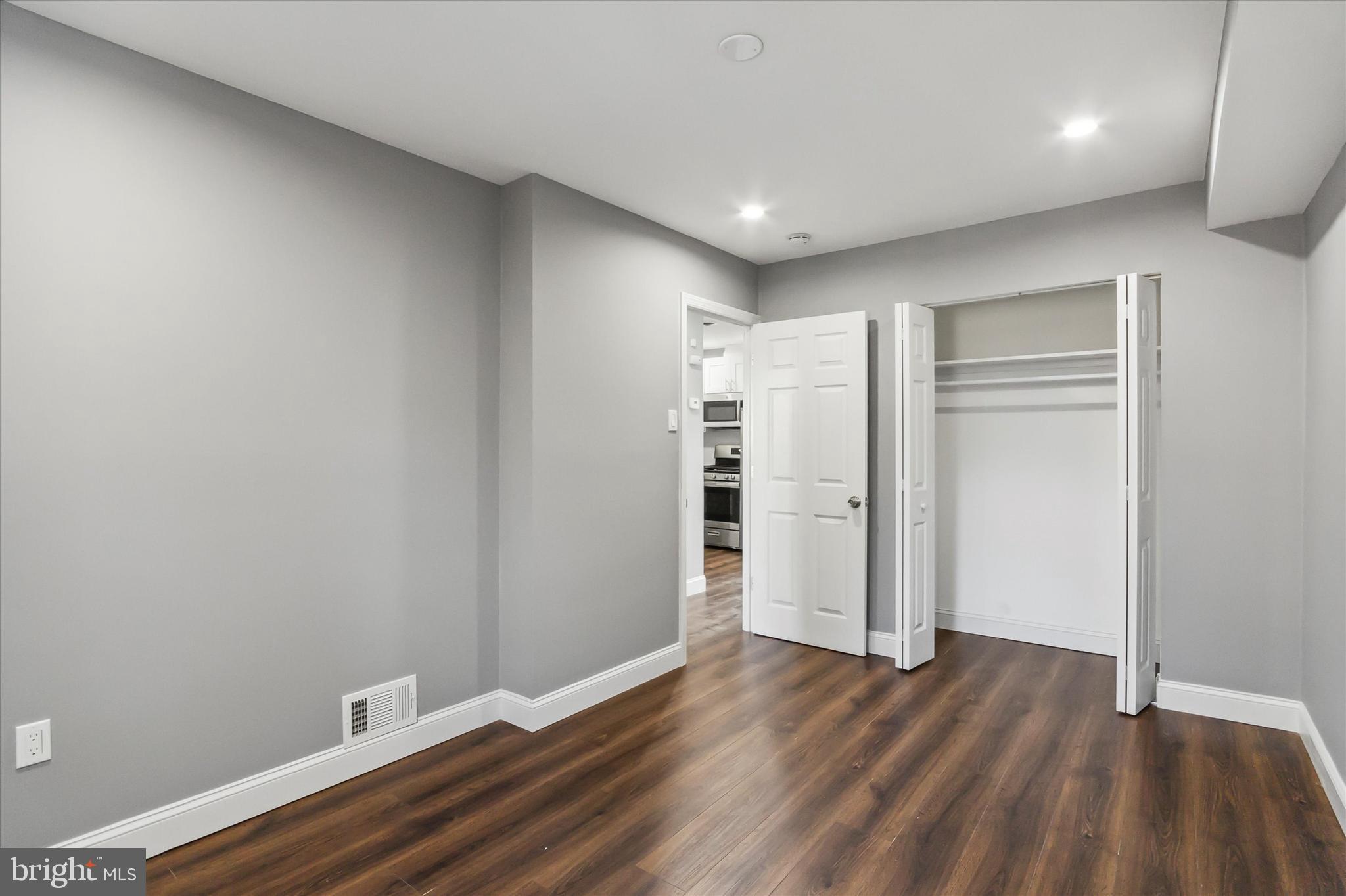 296 Greenough Street, Unit 2 Philadelphia, PA 19127 - Photo 17 of 24 a view of an empty room with wooden floor