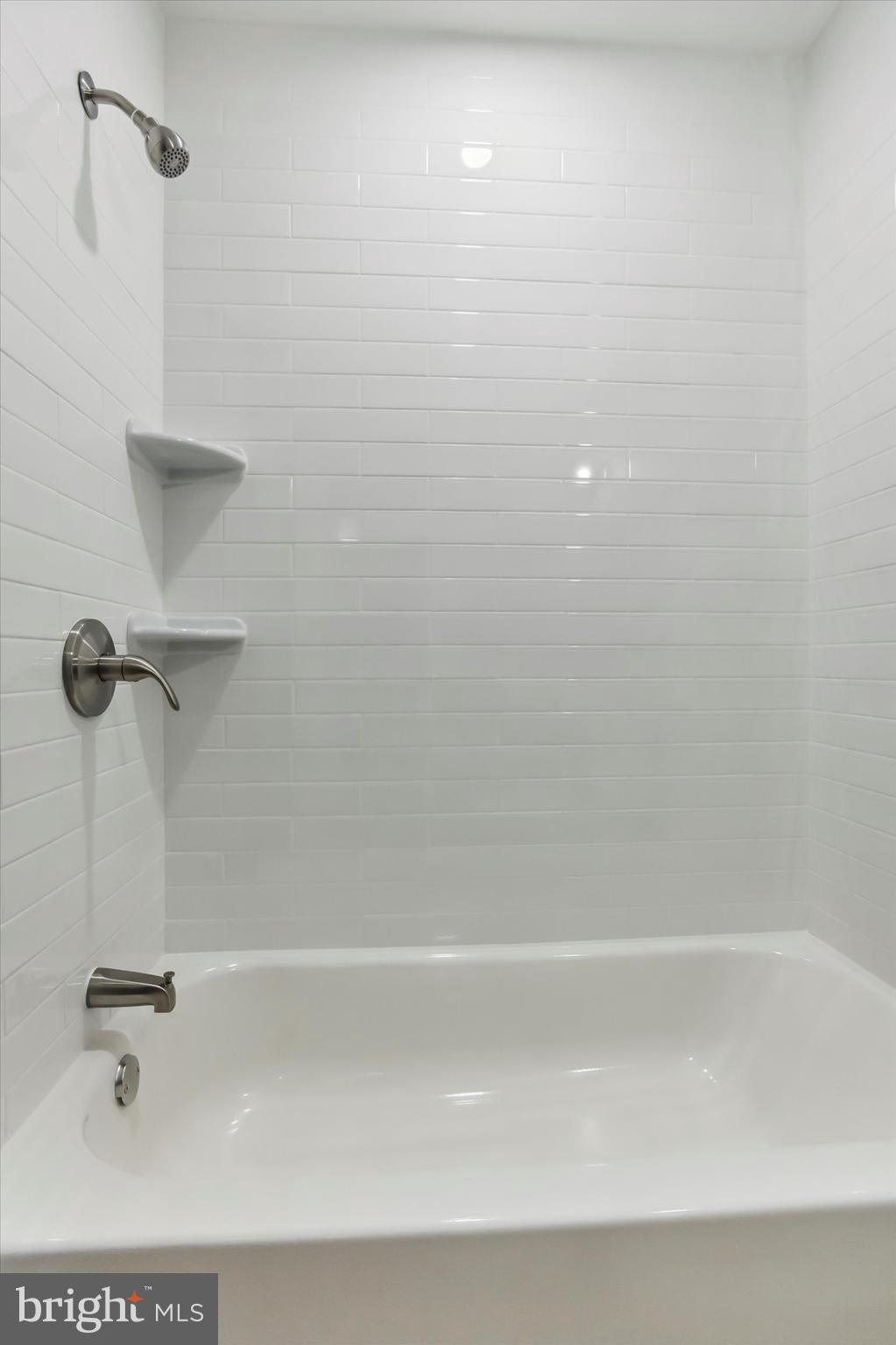 296 Greenough Street, Unit 2 Philadelphia, PA 19127 - Photo 21 of 24 a close up of a bathtub