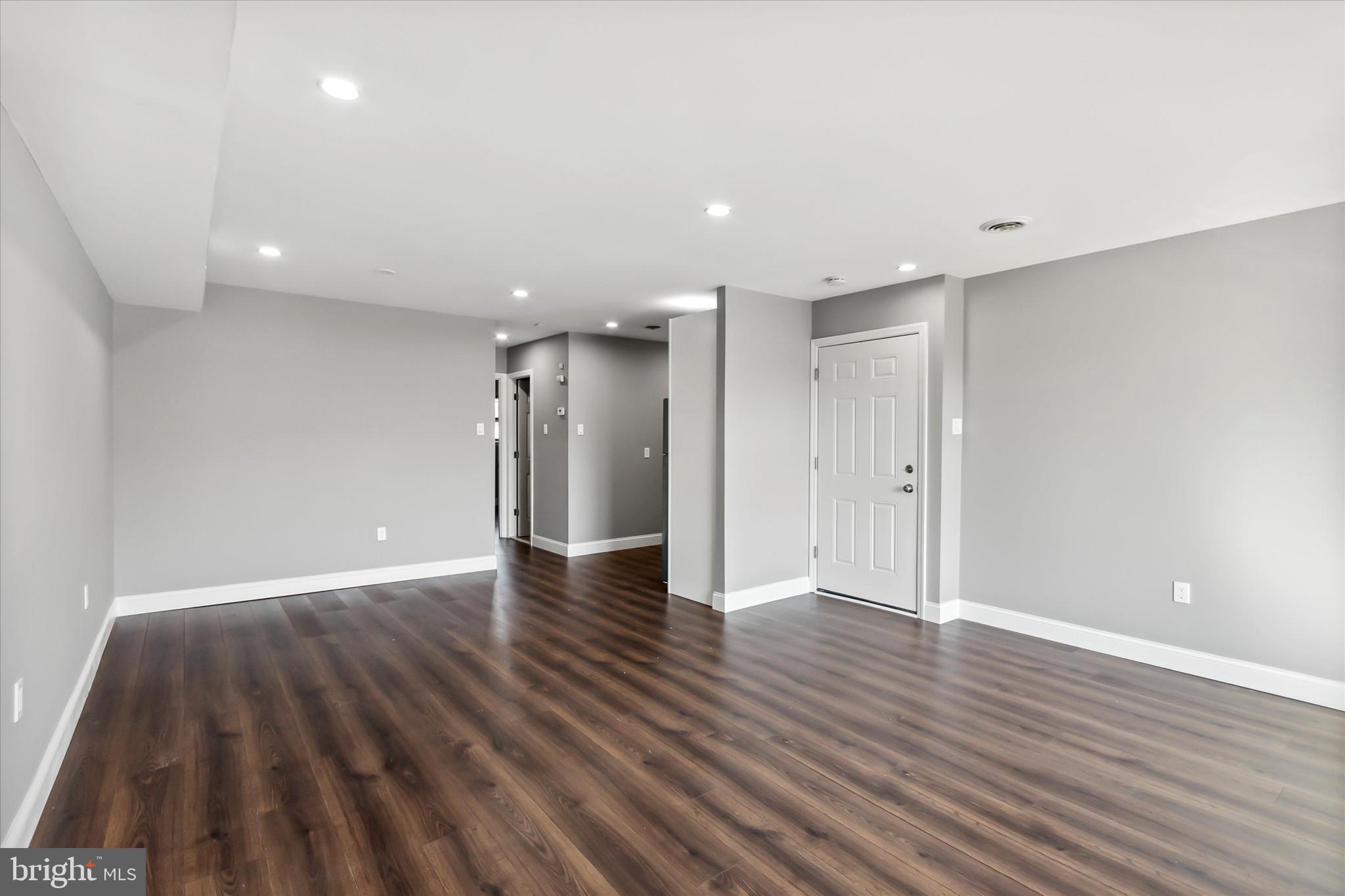296 Greenough Street, Unit 2 Philadelphia, PA 19127 - Photo 3 of 24 a view of an empty room with wooden floor