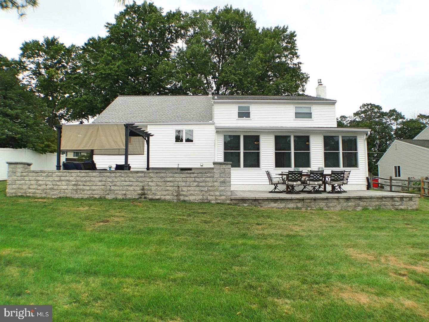 279 Norfolk Road Warminster, PA 18974 - Photo 39 of 41 Rear View of House and Fenced Backyard