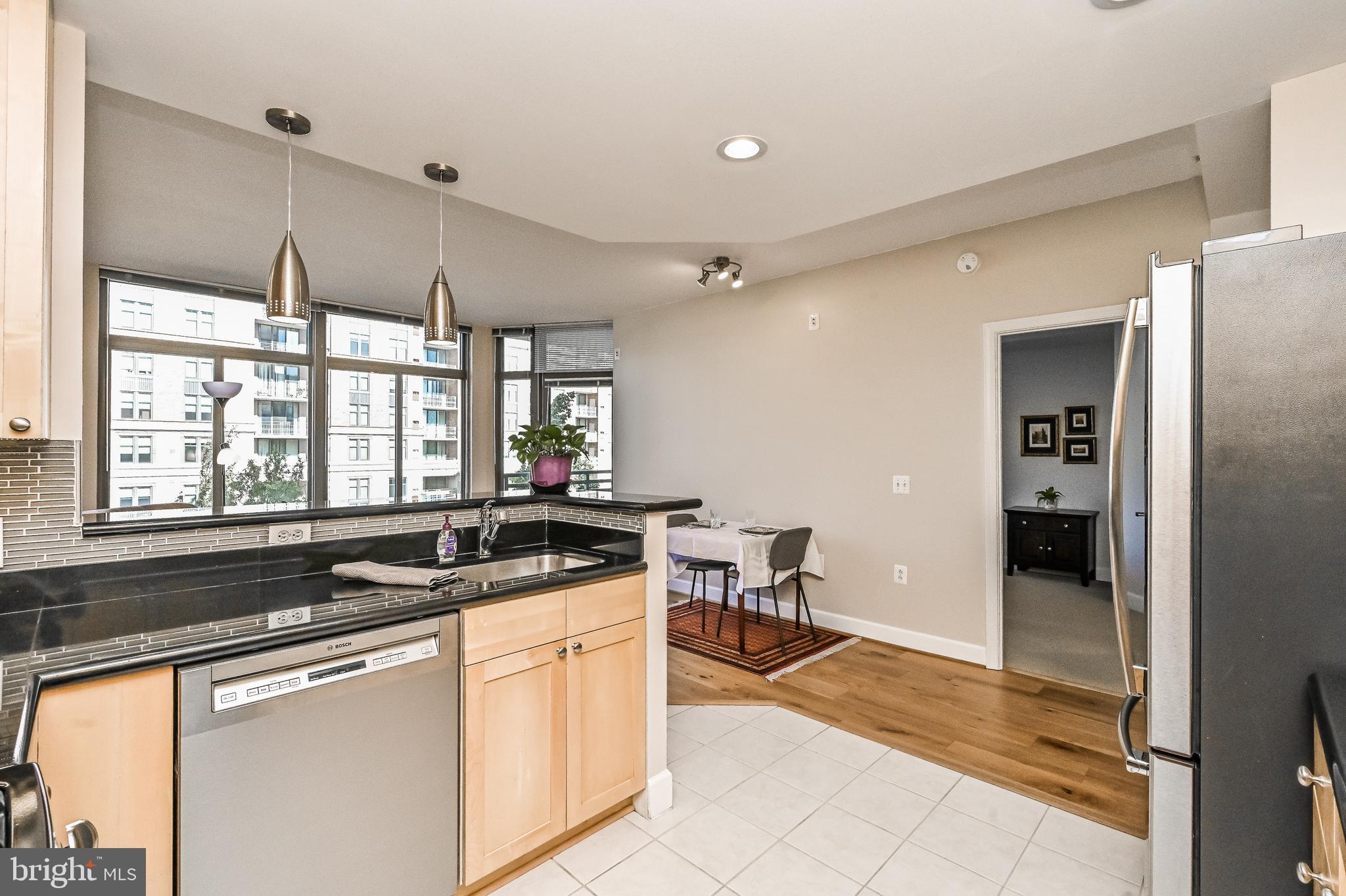 3650 South Glebe Road, Unit 345 Arlington, VA 22202 - Photo 8 of 46 Bartop Overlooking Living Area