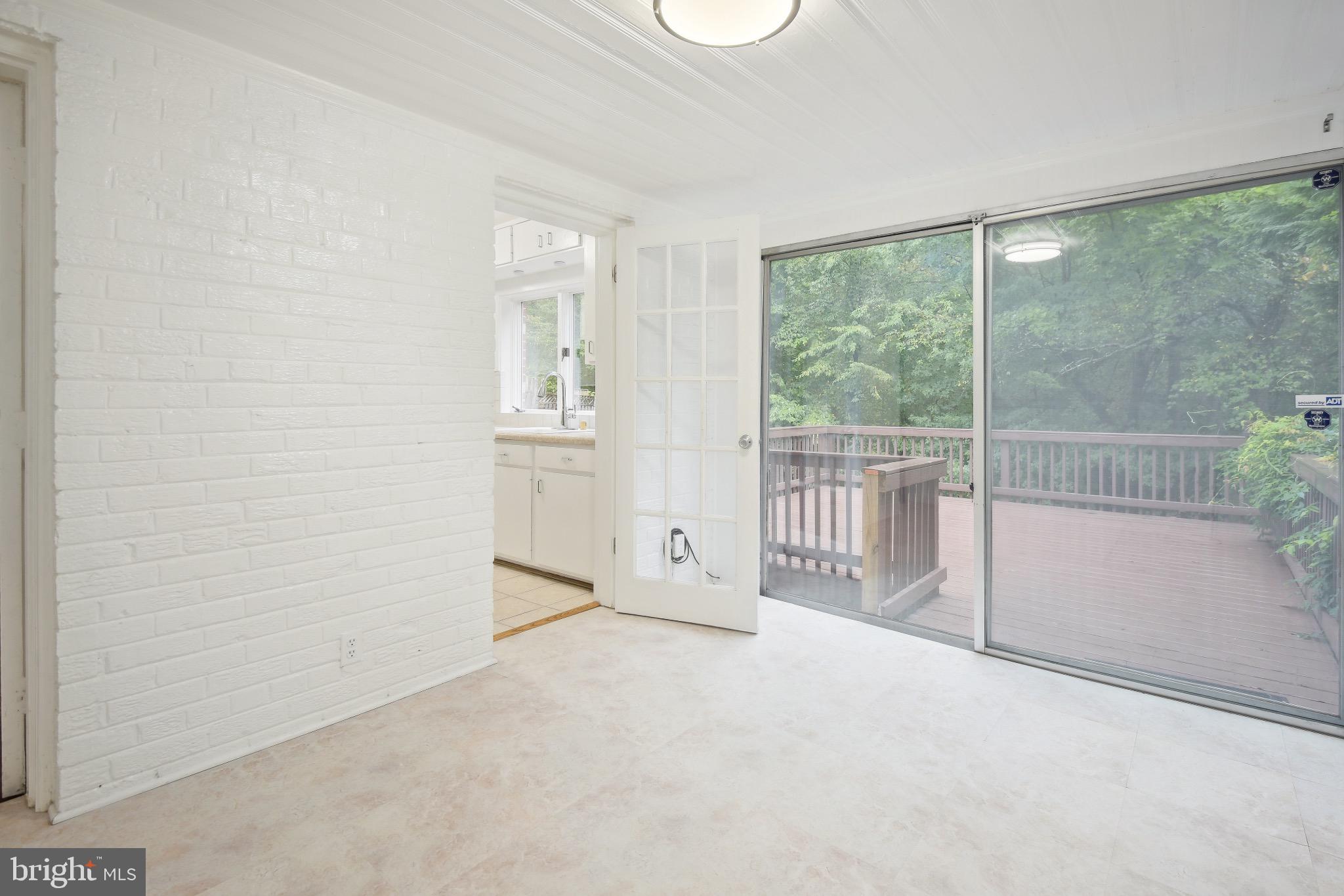2926 Kanawha Street Northwest Washington, DC 20015 - Photo 16 of 34 an empty room with windows