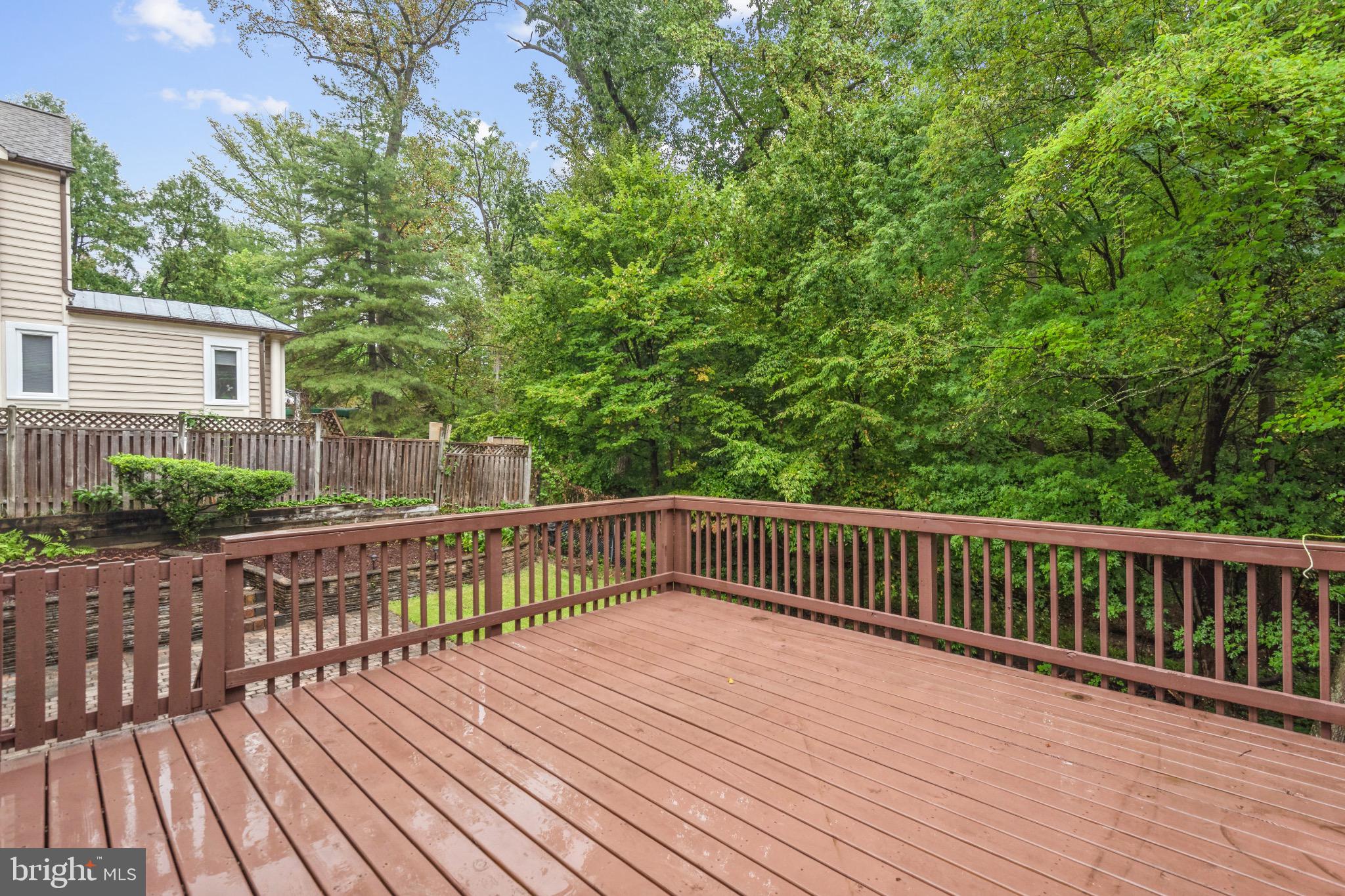 2926 Kanawha Street Northwest Washington, DC 20015 - Photo 17 of 34 a view of deck with wooden floor and outdoor seating