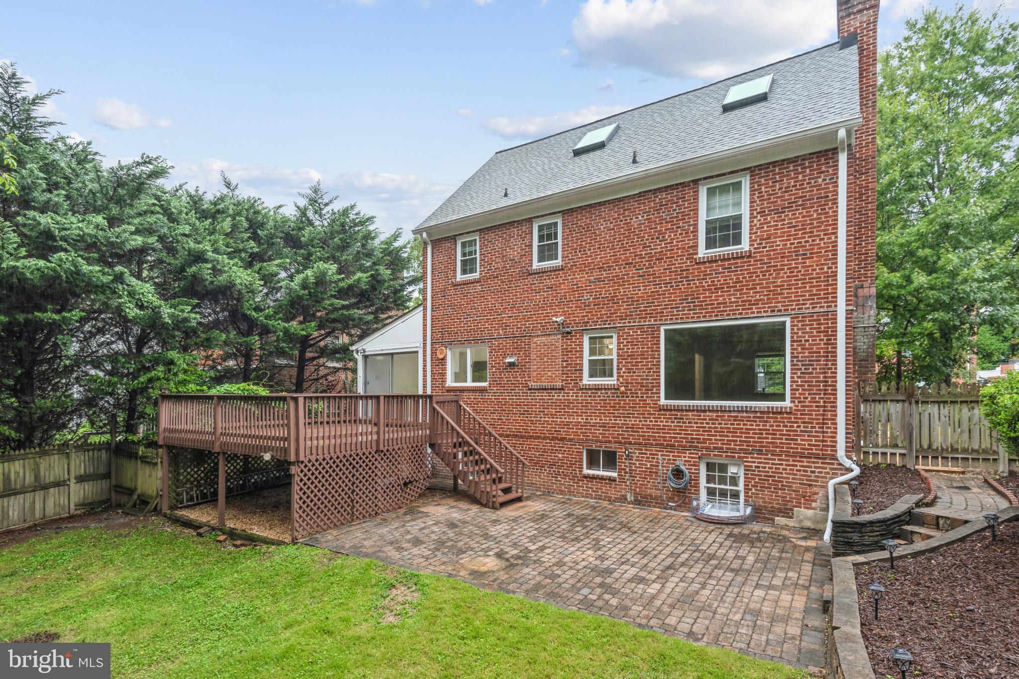 2926 Kanawha Street Northwest Washington, DC 20015 - Photo 30 of 34 a backyard of a house with seating space