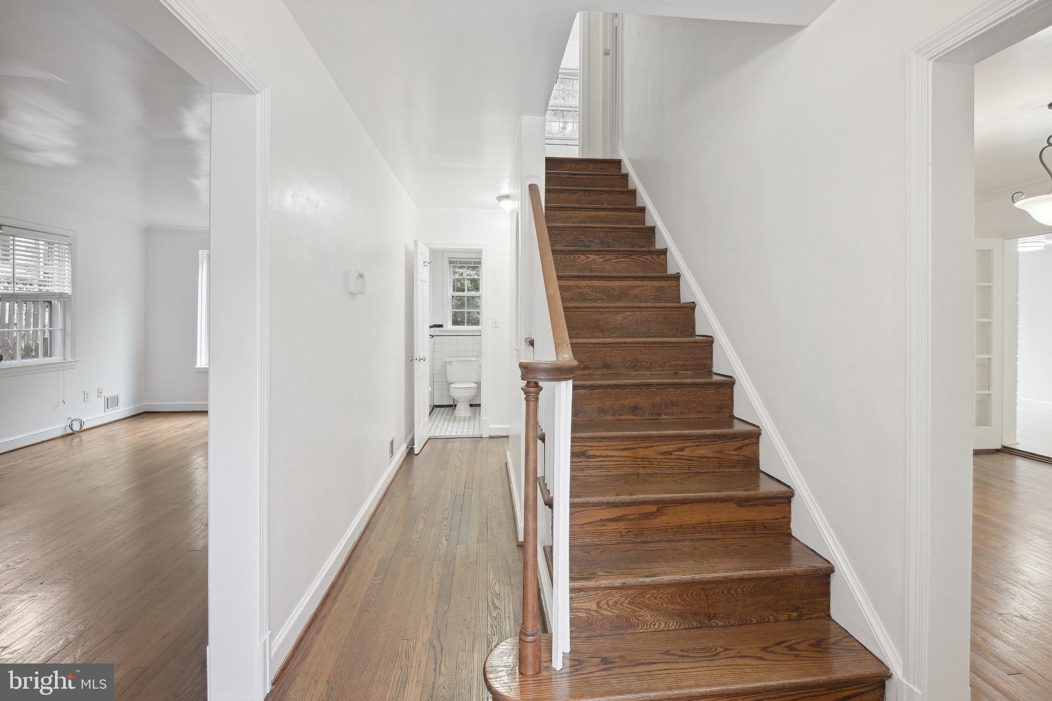 2926 Kanawha Street Northwest Washington, DC 20015 - Photo 4 of 34 a view of entryway and hall with wooden floor